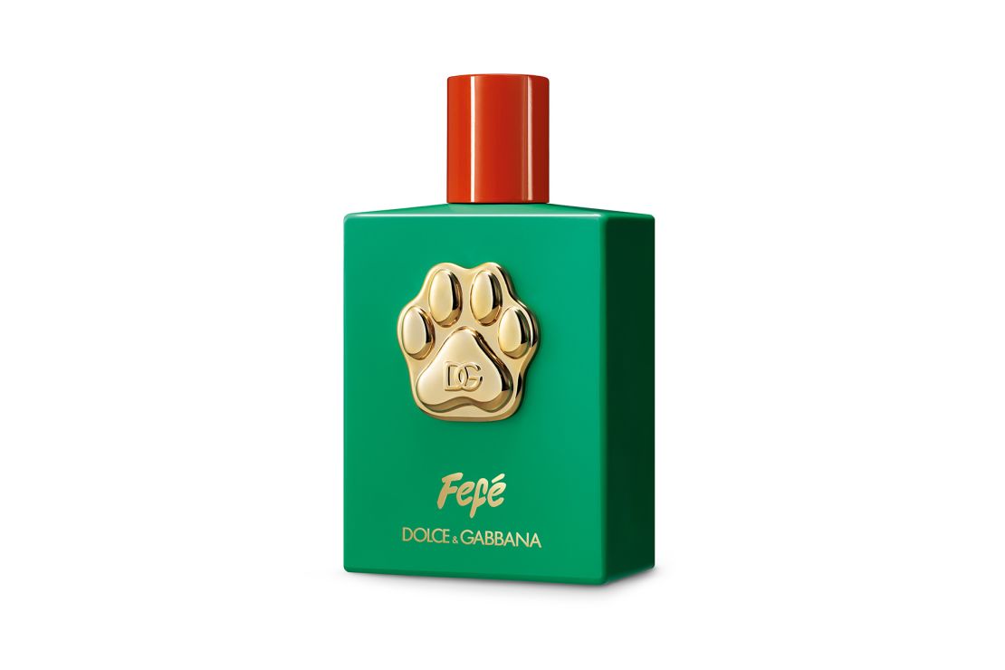 The green lacquered glass bottle features a 24-carat gold-plated paw.