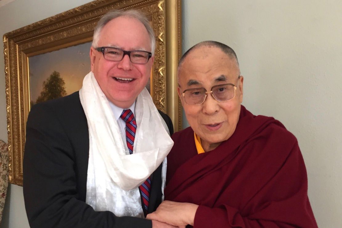 Tim Walz poses for a picture with the Dalai Lama in 2016.