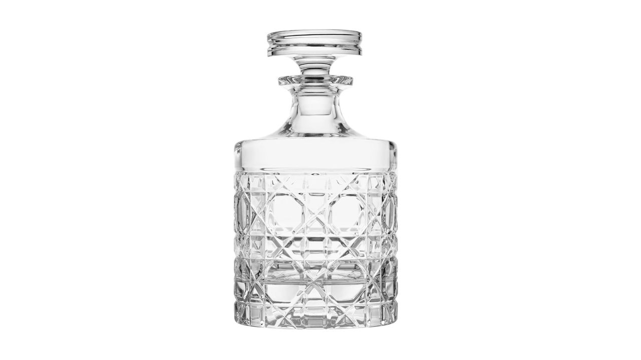 A crystal Dior Whisky Decanter on a white background.