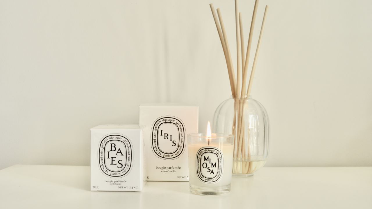 A photo of three DIPTYQUE Travel Candles