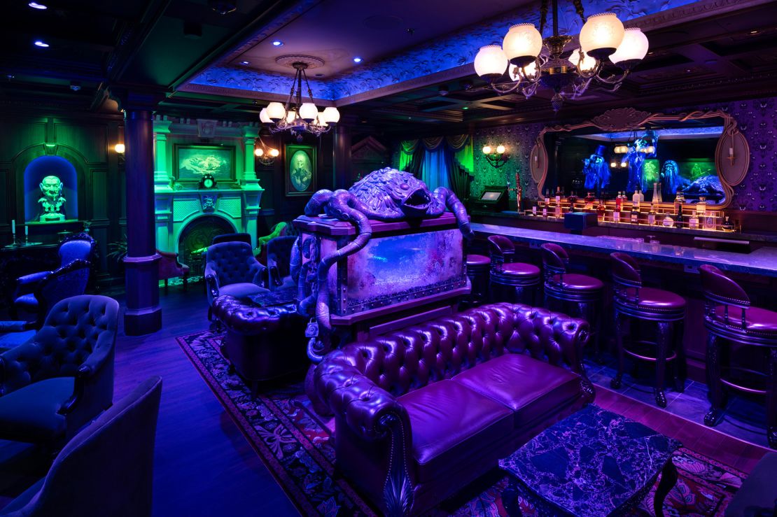 The Haunted Mansion Parlor caters to adults aboard the new Disney Treasure, with its fan-favorite theme and specialty cocktails.