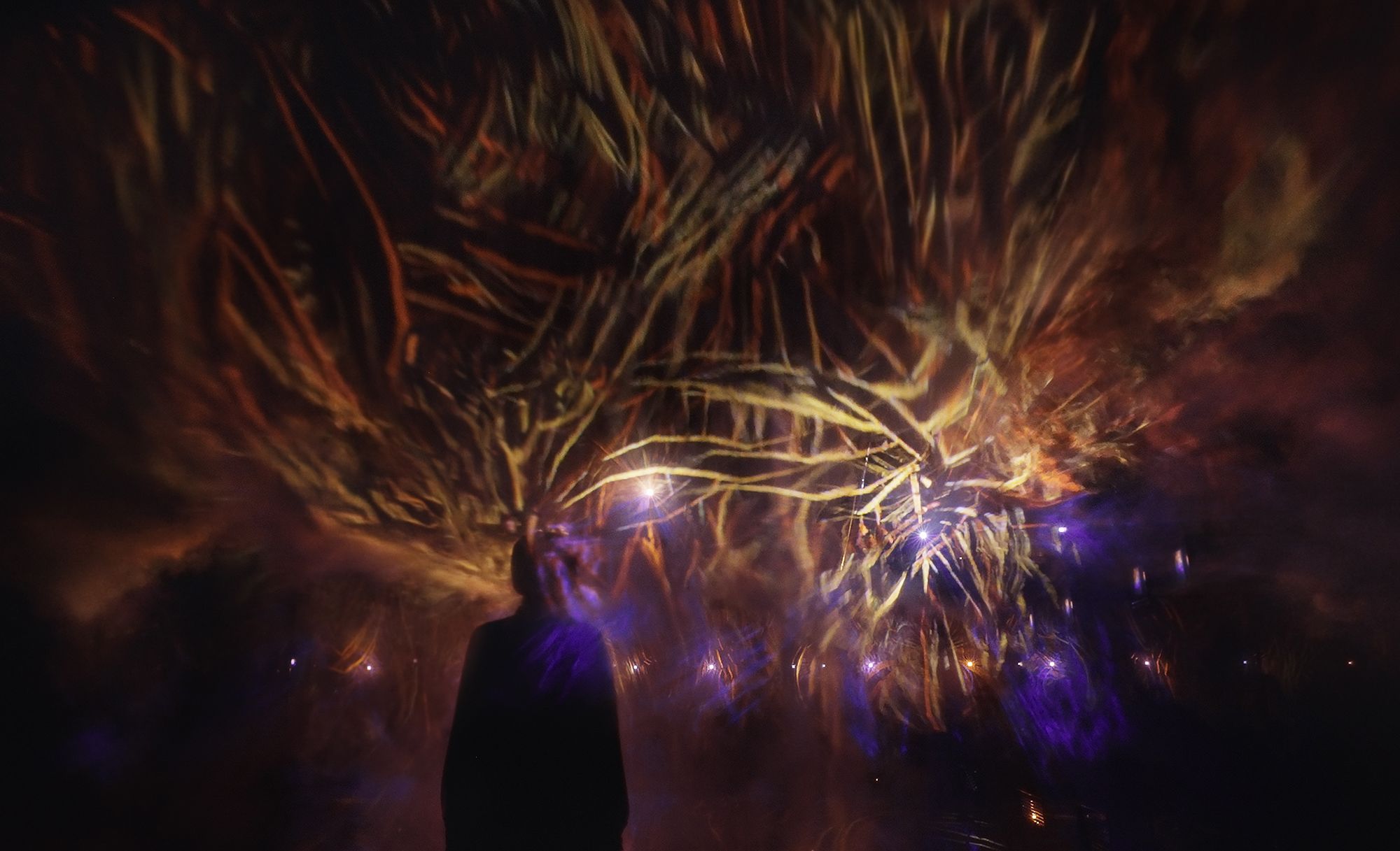 One of teamLab's new installations, "Universe of Fire Particles Dissolving."