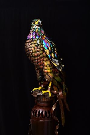 This sculpture of an eagle features visually striking iridescent feathers.