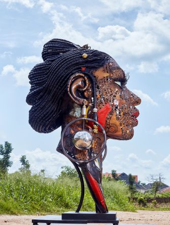 Nigerian artist Dotun Popoola creates polychromatic sculptures from scrap materials. “Irinkemi Asake” (pictured) is a 12-foot-tall, 882-pound piece depicting the decorated head and neck of an African woman, made from scrap metal, galvanized pipes, automobile parts, stainless steel, and wrought iron. The piece is being shipped to the Legacy Museum, in Alabama, which explores the history and legacy of slavery in America. <strong>Scroll through the gallery to see more of his work.</strong>