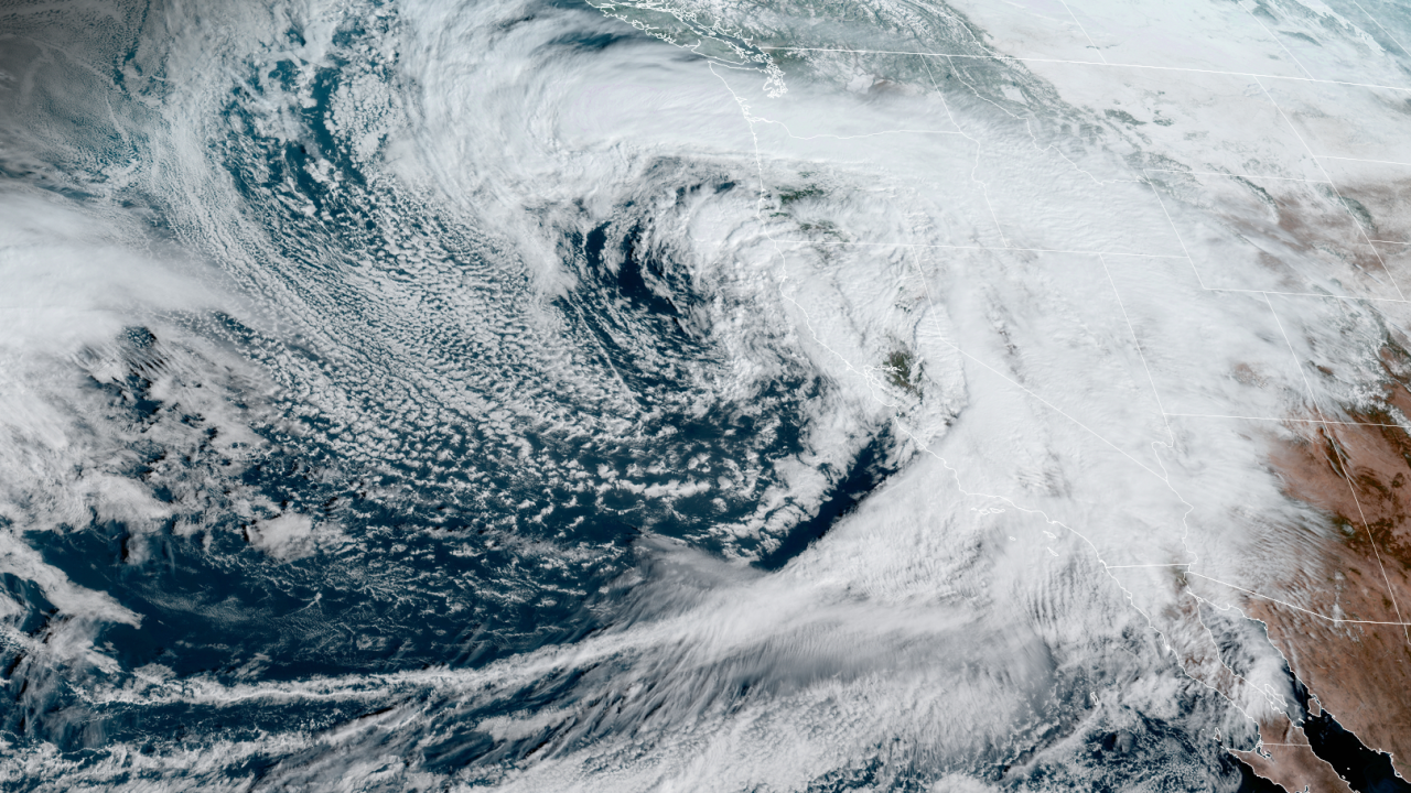 Satellite imagery captures a wide-reaching atmospheric river-fueled storm slamming California Thursday.