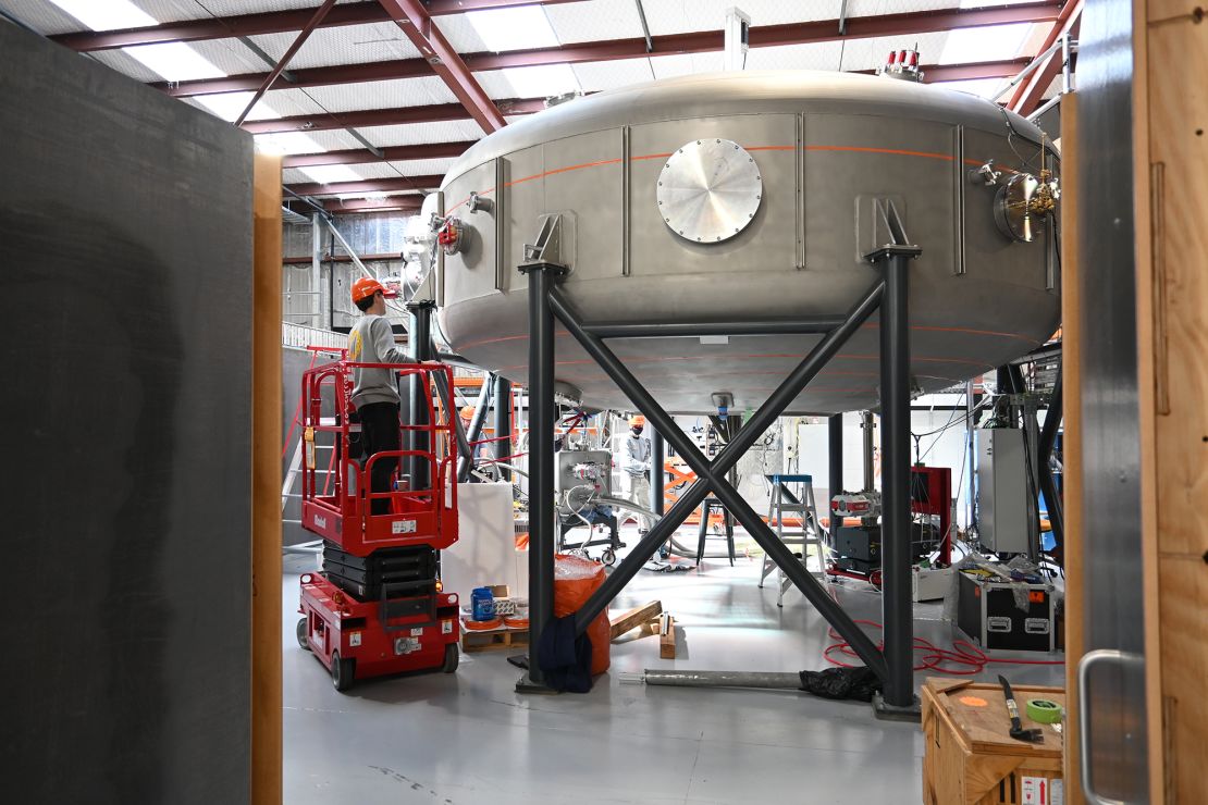 The fusion reactor looks like a steel donut on legs and is housed in a warehouse in Wellington, New Zealand.