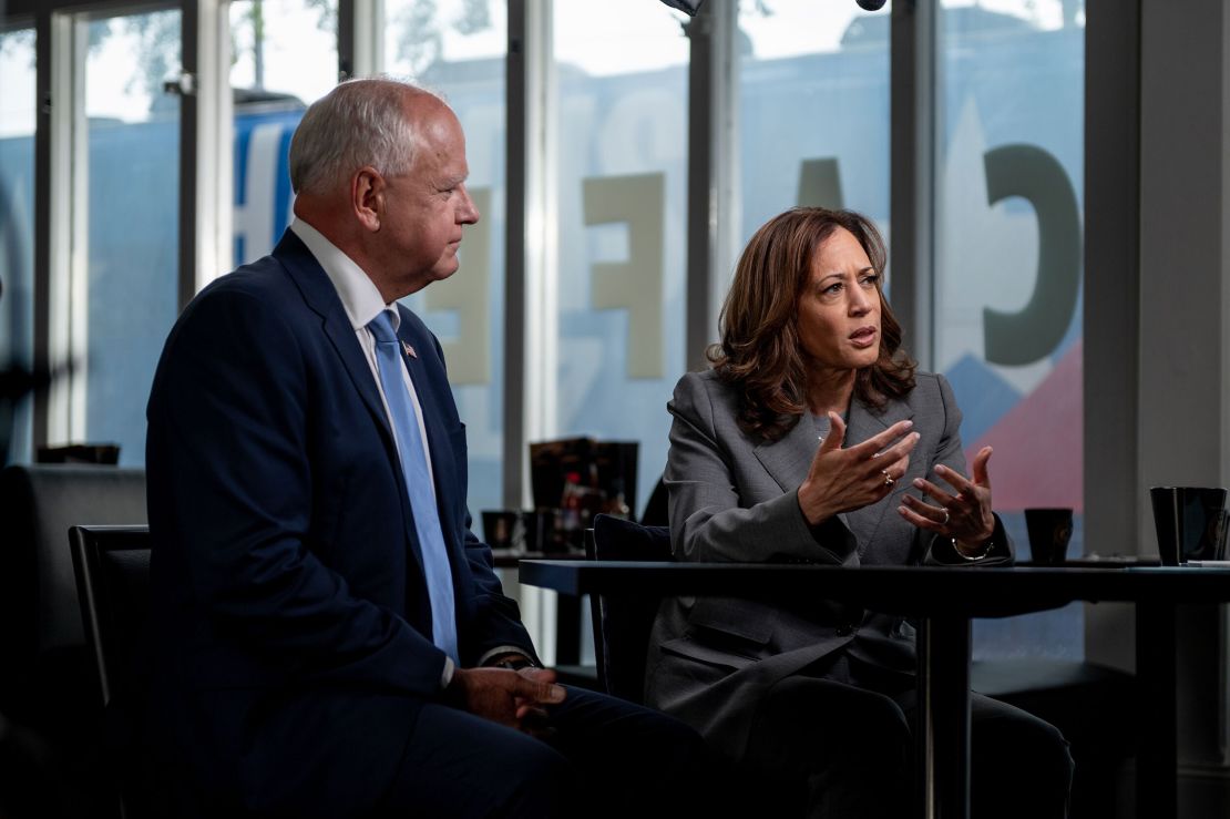 Minnesota Gov. Tim Walz and US Vice President Kamala Harris sit for an interview with CNN’s Dana Bash on Thursday, August 29, 2024, at Kim’s Cafe in Savannah, Georgia.