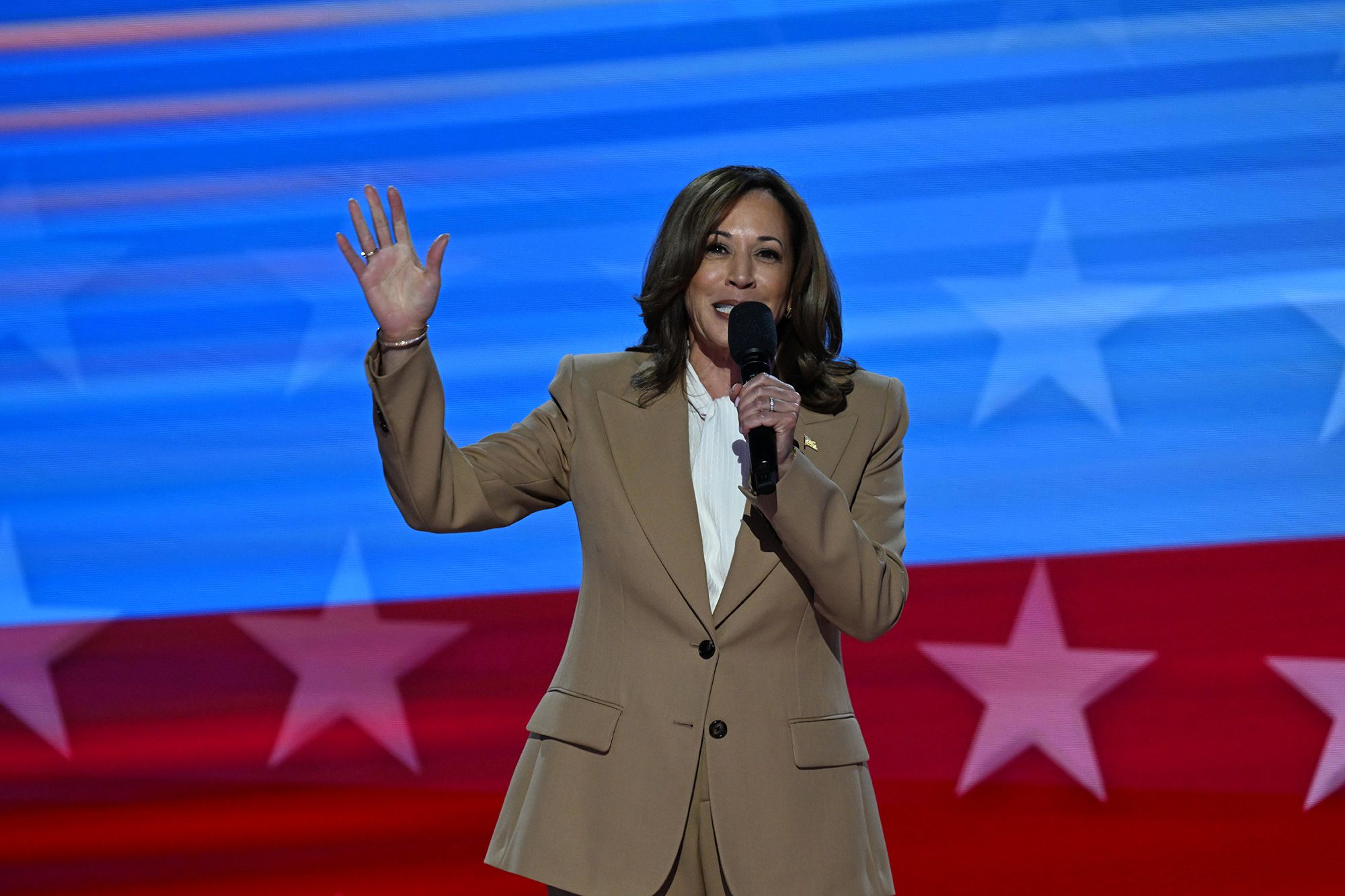 Kamala Harris wore a two-piece brown suit by Chloe to make a surprise appearance at the Democratic National Convention in Chicago on Monday.