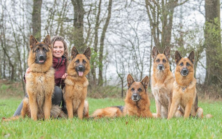 <strong>Canine companions</strong>: Dog photographer John Fabiano has been traveling the world and documenting the relationships between dogs and humans. In Germany, he photographed dog breeder Laura Schmidtk and her pack of German Shepherds.