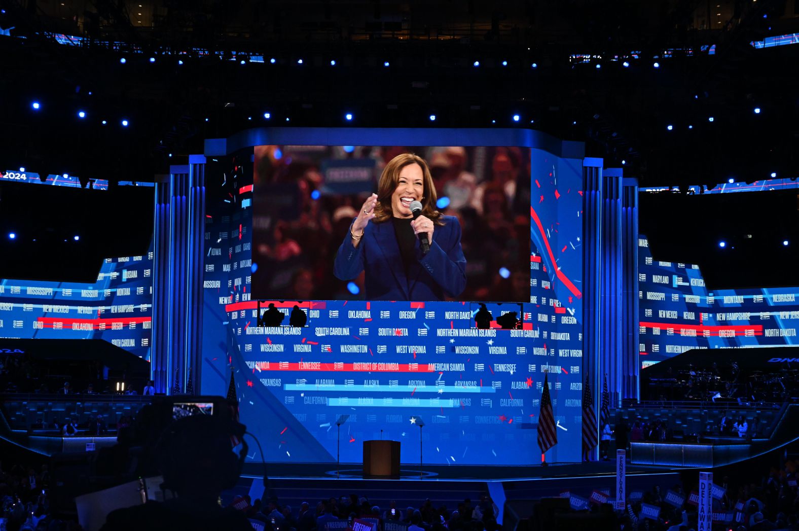 Harris <a >appears via video</a> to symbolically accept the party's nomination after a ceremonial roll call on Tuesday. She and Walz were in Milwaukee for a campaign rally. “We are so honored to be your nominees,” Harris said. “This is a people-powered campaign, and together we will chart a new way forward.”