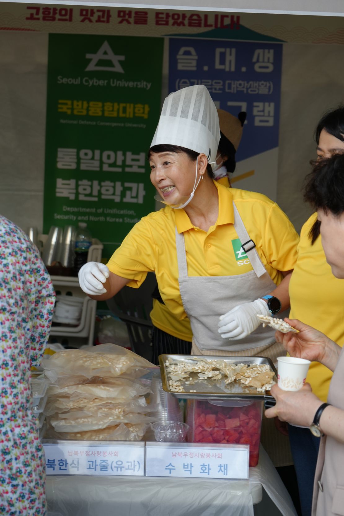 A booth at the Defectors' Day festival sells North Korean styles of traditional treats, including watermelon punch (hwachae), the glutinous rice dessert yugwa, and the deep-fried sweet yakgwa.