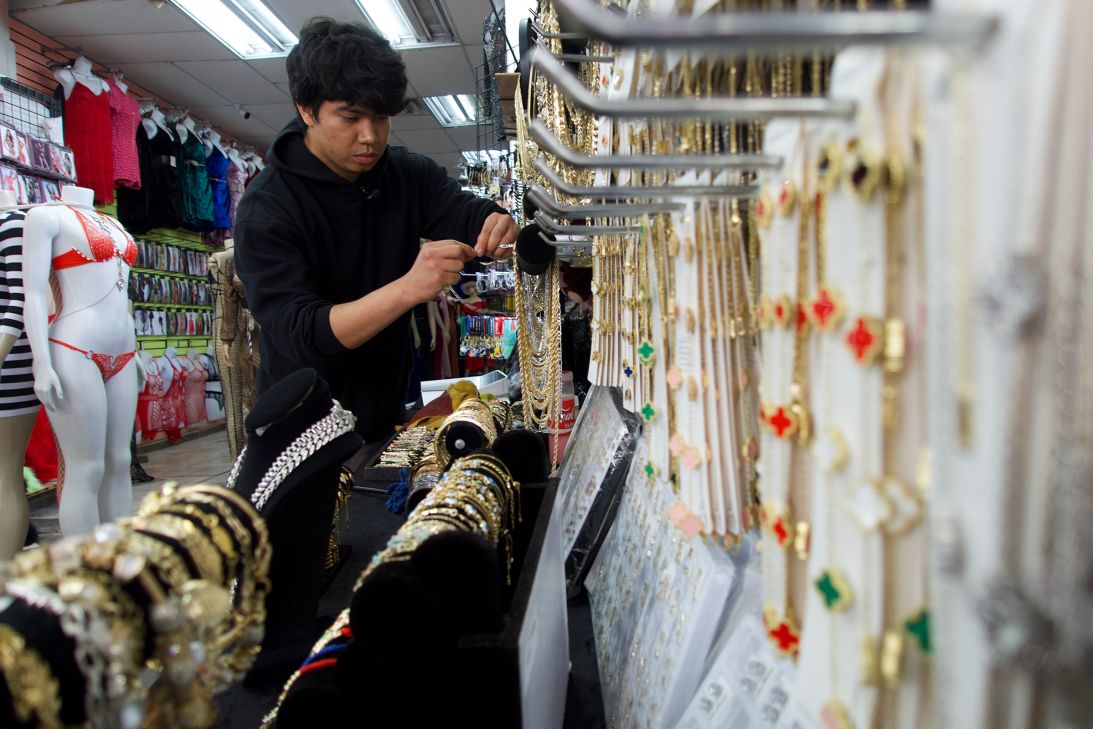 Christopher Perez is keeping his store open on Santee Alley even with so many fewer visitors.