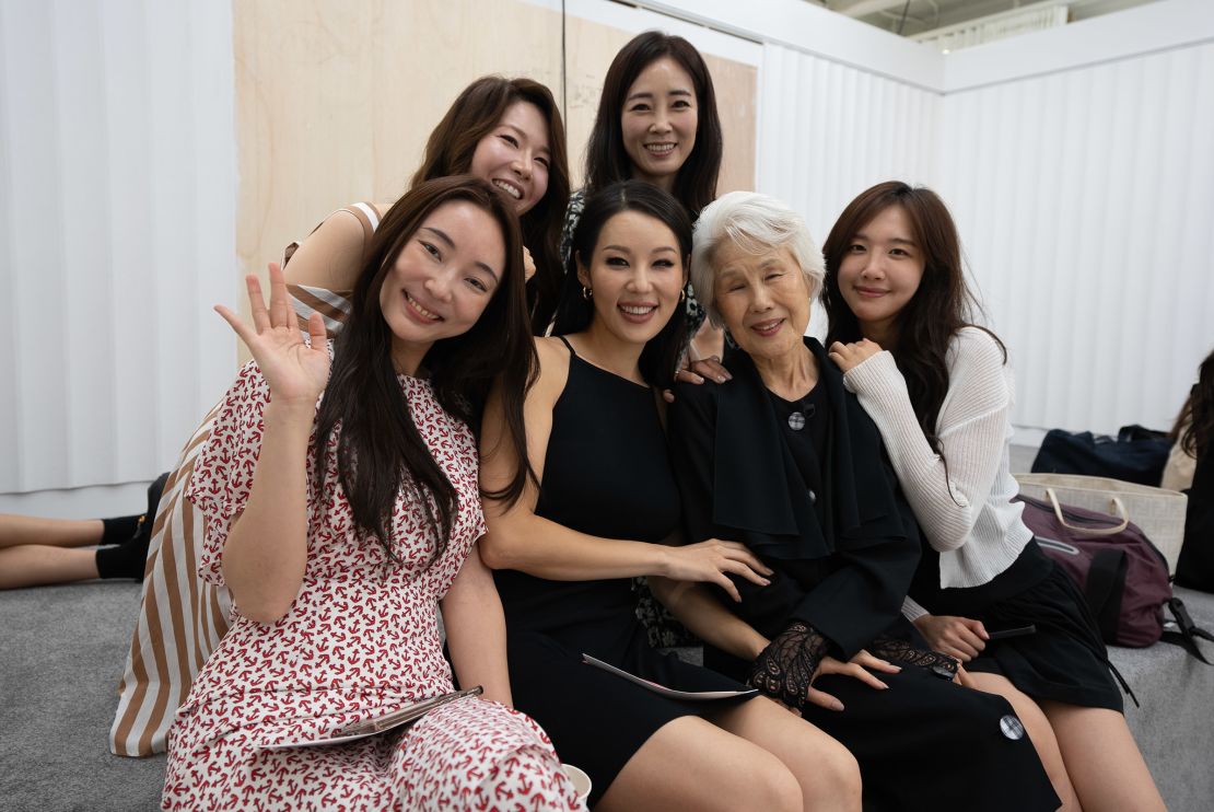 Choi surrounded by fellow Miss Universe Korea contestants at a pageant rehearsal on Friday.