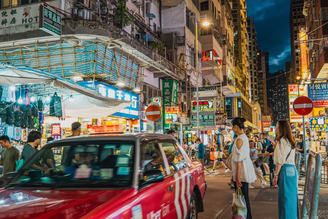 The same Hong Kong street, now mostly stripped of its iconic neon signs and billboards, on May 24.