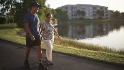 Dr. Sanjay Gupta walks with his mom.