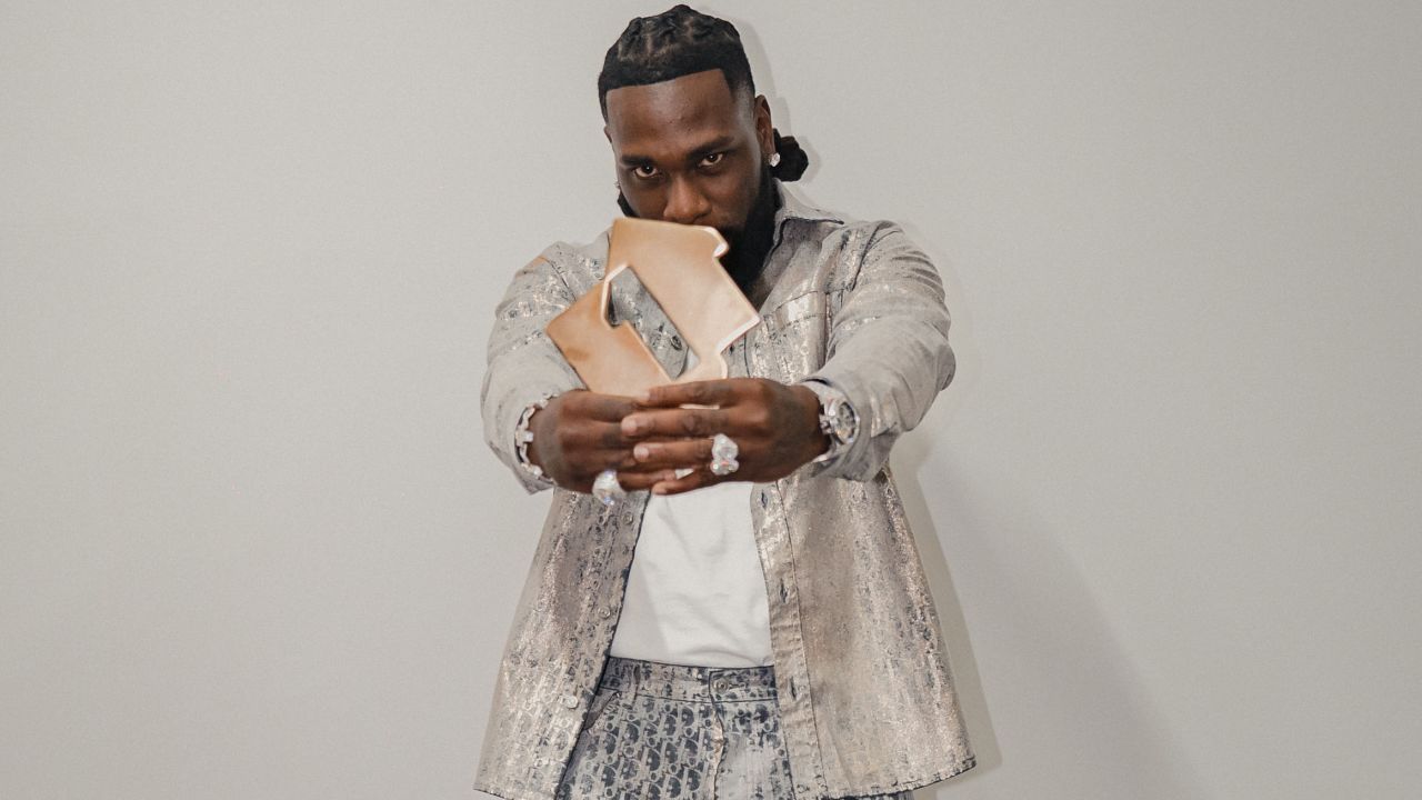 Nigerian Afrobeats superstar Burna Boy celebrates his latest history-making feat, topping the UK albums chart.