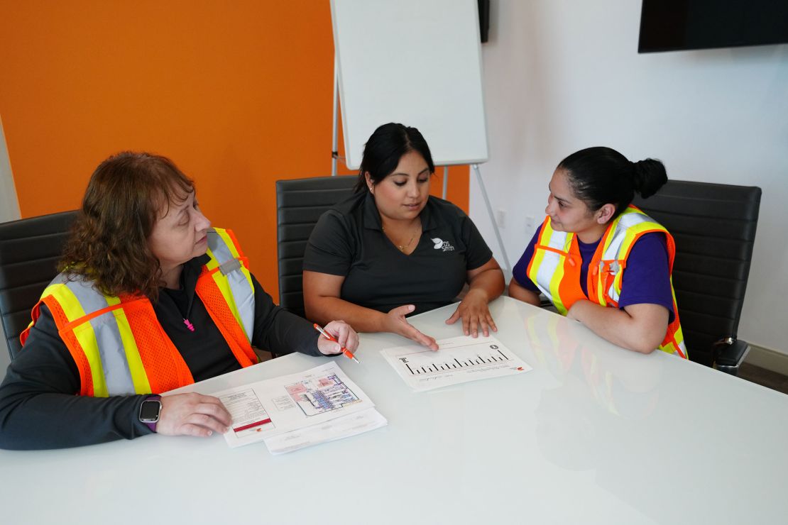 Becky Gordon, the human resources manager at DS Smith's Lebanon, Indiana, plant, left, hired Elissa Ramirez, center, as an interpreter to enable the manufacturer to hire more Spanish-speaking workers.