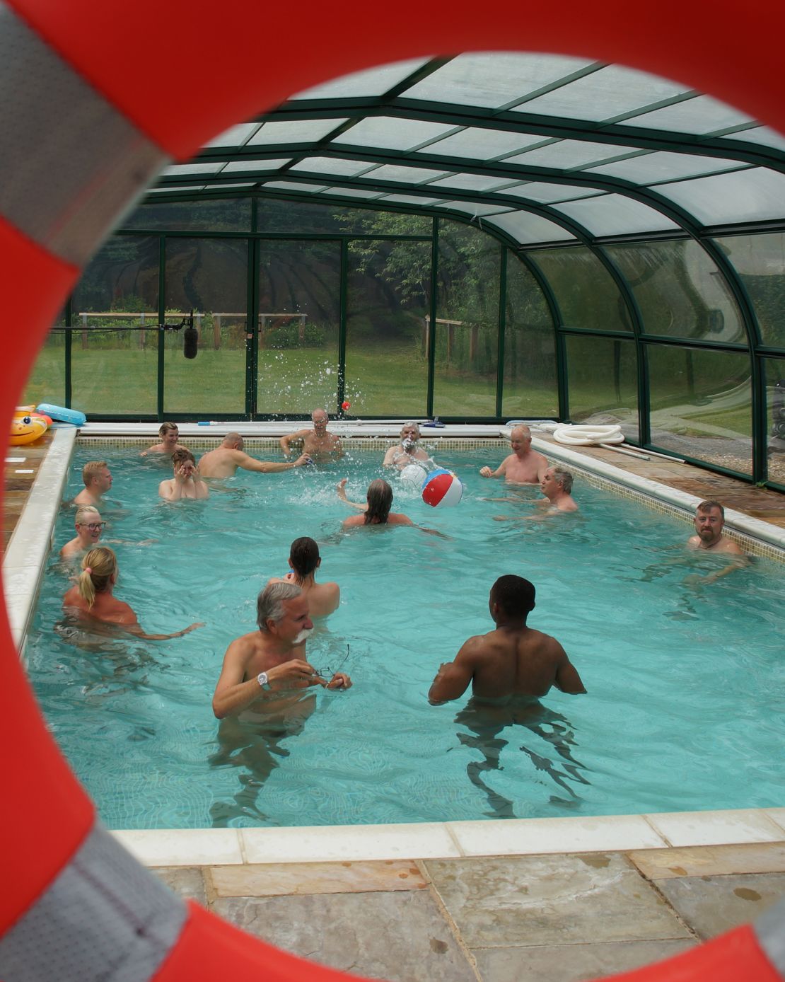 The president of the INF-FNI, Stéphane Deschênes (front left), joins guests taking part in the Great British Skinny Dip charity event as part of Sunfolk's opening day activities.
