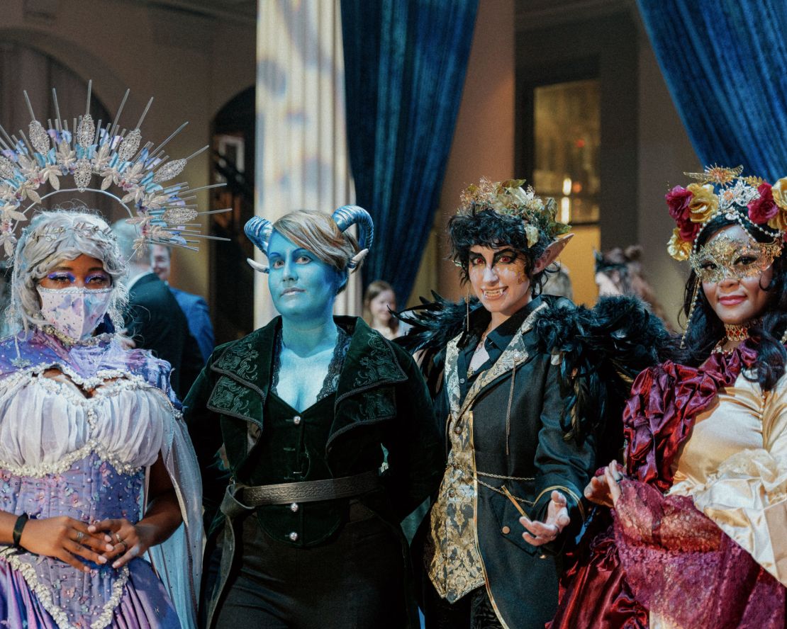 Attendees pose for a group photo at Eudantria Events' fantasy ball on Feb. 10, 2024 in Houston, Texas.