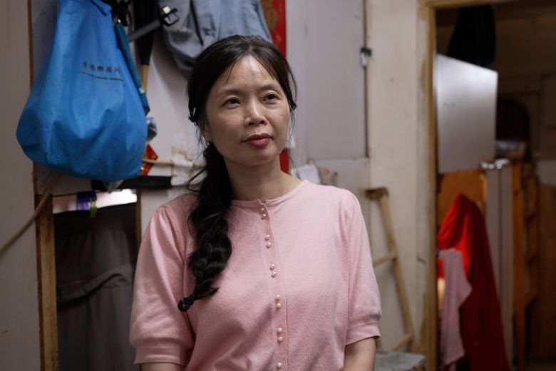 Ms. Sze at a subdivided unit in Sham Shui Po, Hong Kong, on July 3, 2025.