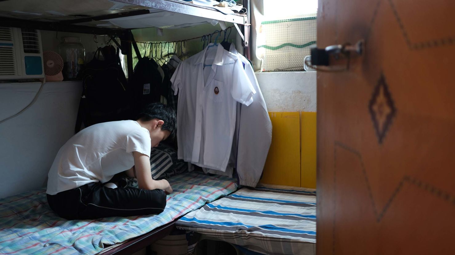 Ms. Yeung's grandson in their shared bedroom at their home on Kweilin Street in Sham Shui Po, Hong Kong, on July 4, 2025.