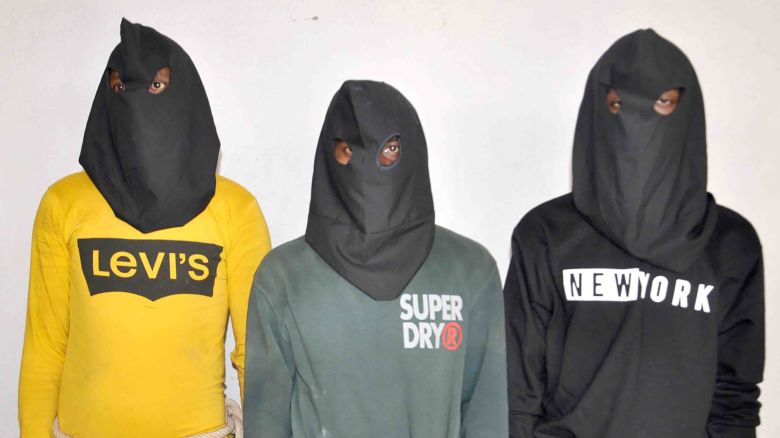 A photo released by Dumka police of the first three men arrested for the alleged rape and assault of a tourist couple in India.