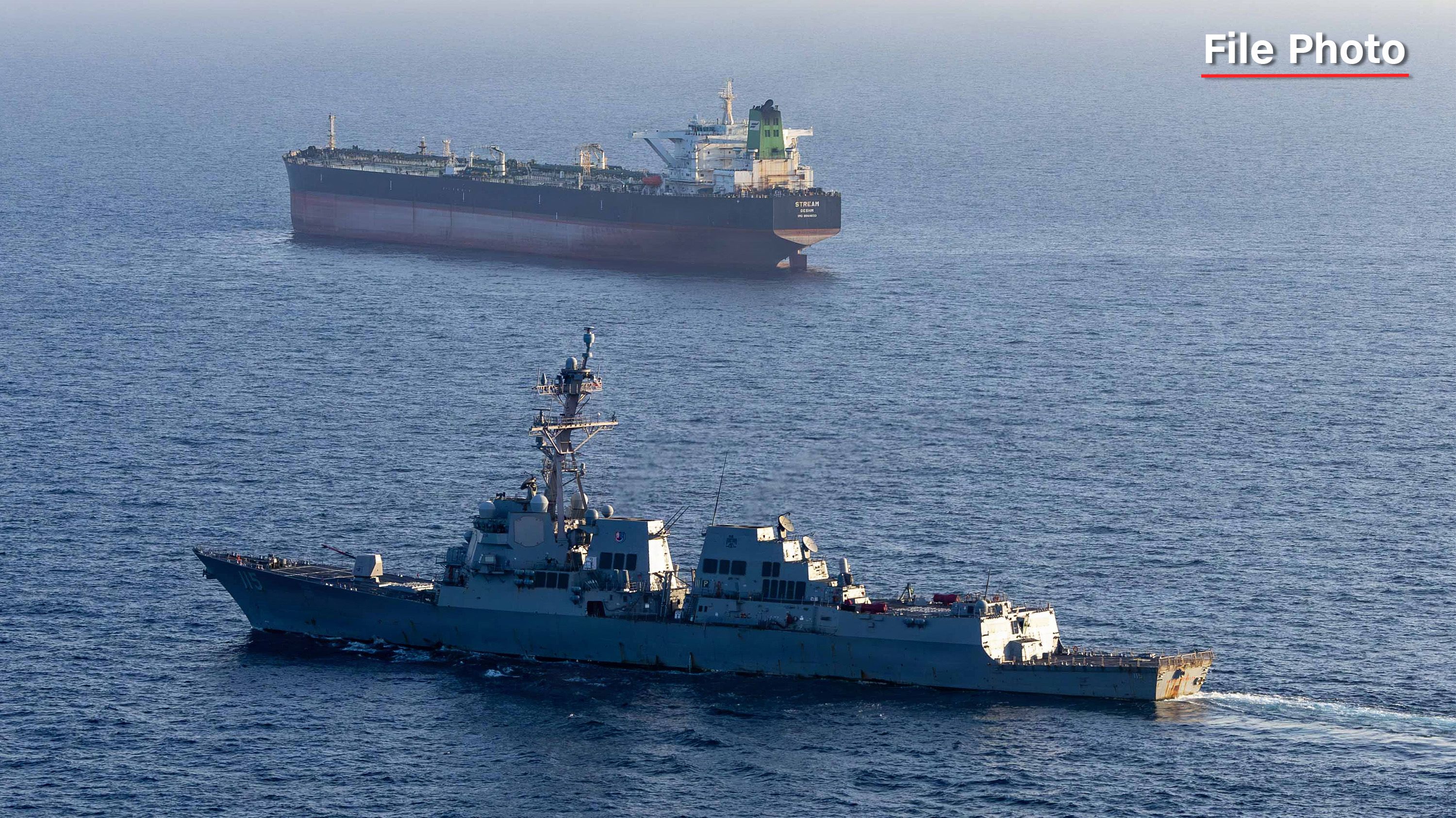 Arleigh Burke-class guided-missile destroyer USS Rafael Peralta (DDG 115) implements a maritime blockade against an Iranian-flagged ship attempting to sail toward an Iranian port, April 26, 2026. Rafael Peralta is deployed to the U.S. 5th Fleet area of operations to support maritime security and stability in the Middle East. (U.S. Navy photo)