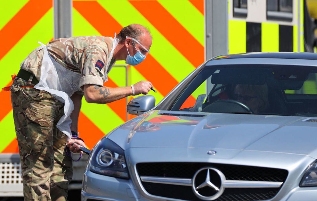 A woman visits a temporary coronavirus testing site run by the armed services at High Wycombe Park & Ride on May 6 in the UK.