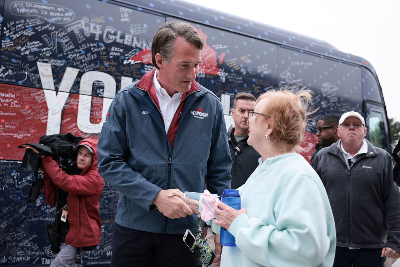 Virginia GOP gubernatorial candidate Glenn Youngkin greets a voter outside Rocky Run Middle School in Chantilly, Virginia, on November 2.