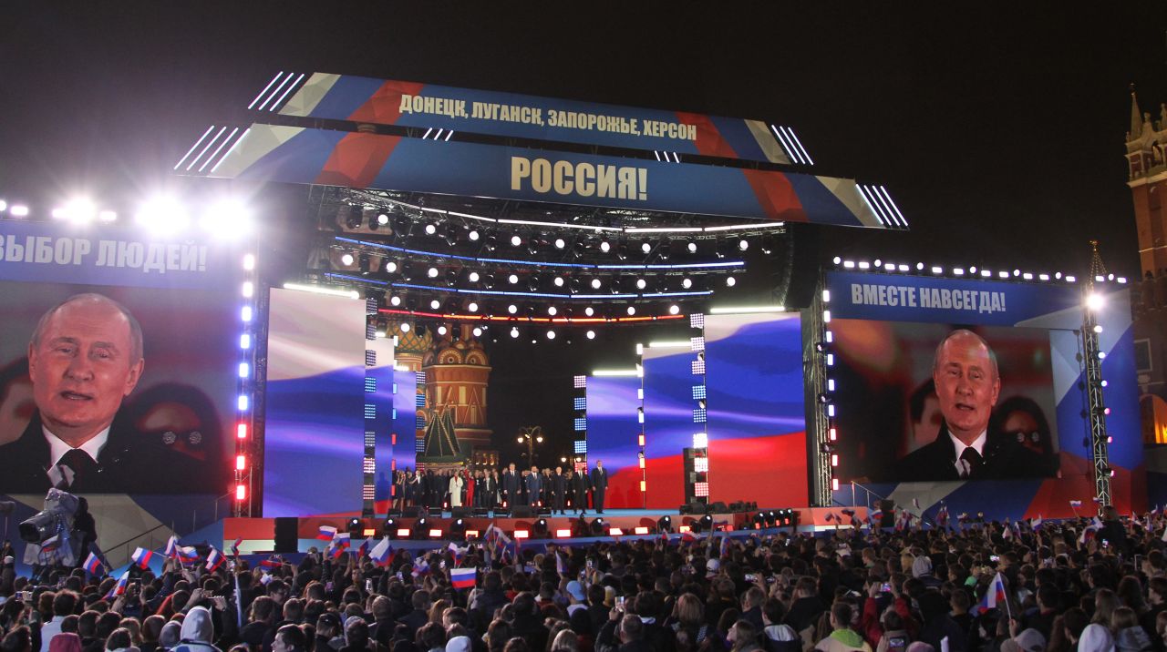 Russian President Vladimir Putin speaks during the concert in support of the annexation of four Ukrainian regions at Red Square, on September 30, 2022 in Moscow, Russia. Separatist leaders of annexed Donetsk, Luhansk, Kherson and Zaporizhzhia regions of Ukraine has arrived in Moscow to sign joint documents.