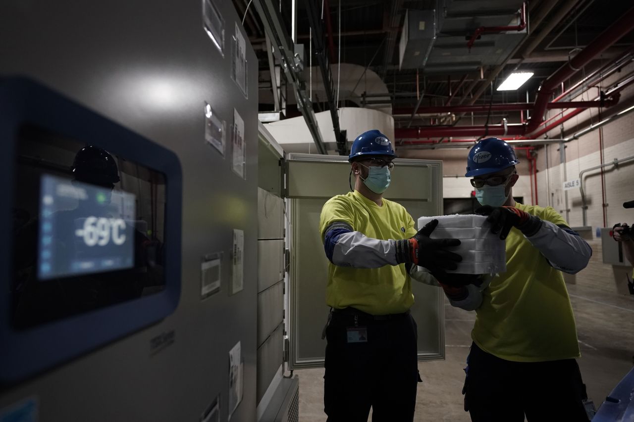 Boxes containing the Pfizer-BioNTech Covid-19 vaccine are prepared for shipment at the Pfizer manufacturing plant in Kalamazoo, Michigan, on December 13.