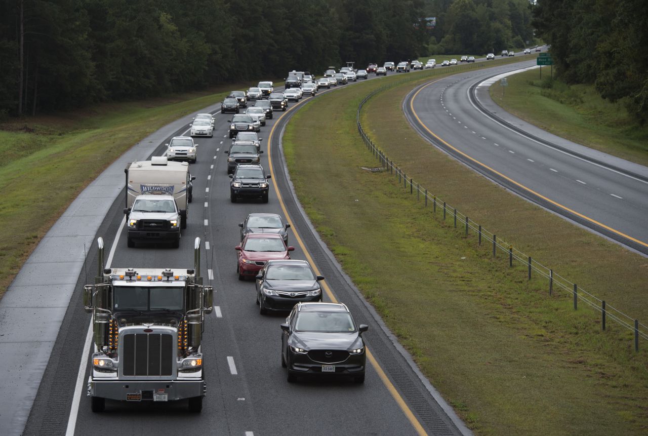 Residents evacuate from coastal areas near Wallace, North Carolina, on September 11, 2018.