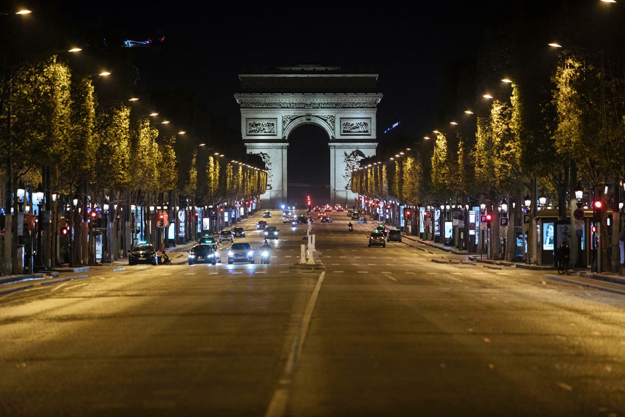 The Champs-Elysees avenue is almost empty during curfew in Paris, on October 17.