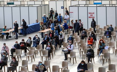 People wait to receive a Covid-19 vaccine at a vaccination center in Nice, France, on April 10.
