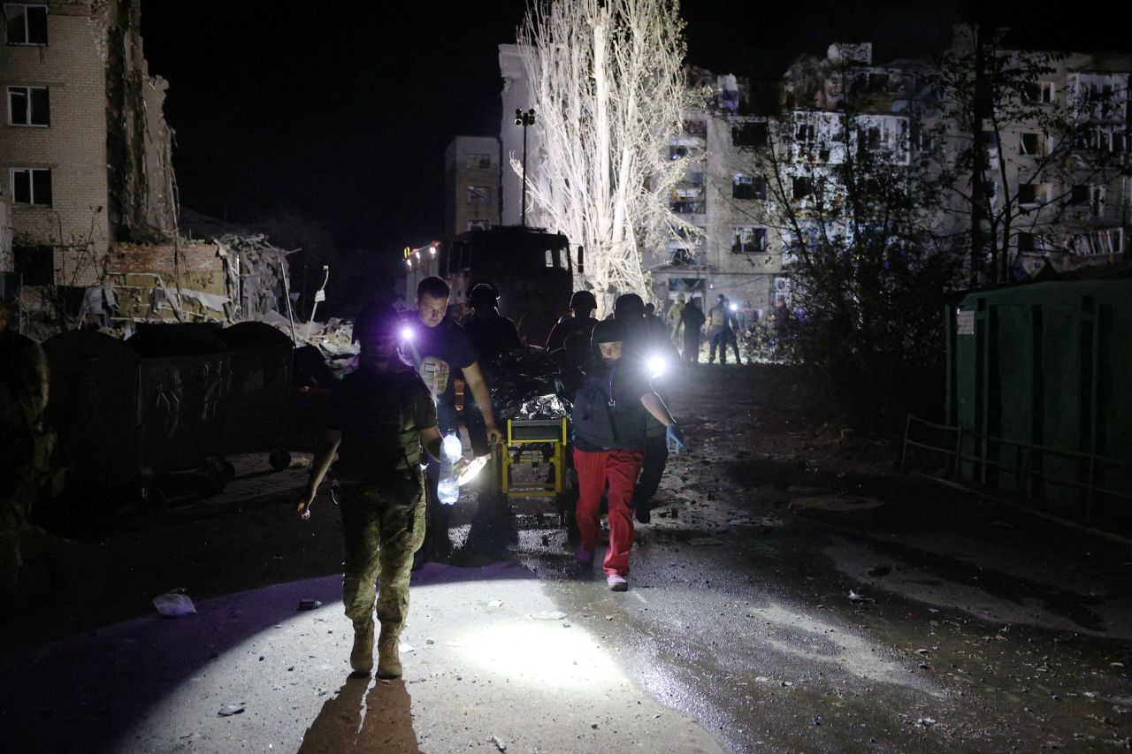 Rescuers carry a wounded person from a damaged building following Russian missile strikes in Pokrovsk, Ukraine. 