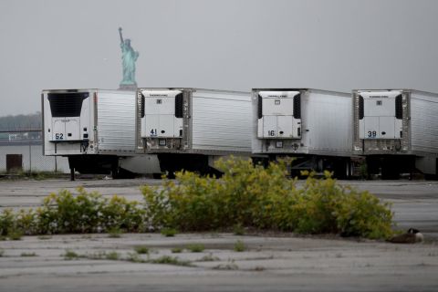 Refrigerated trucks functioning as temporary morgues are seen at the South Brooklyn Marine Terminal on May 6, in New York City. 