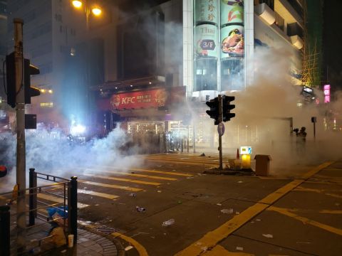 Tear gas is fired on Austin Road, Kowloon.