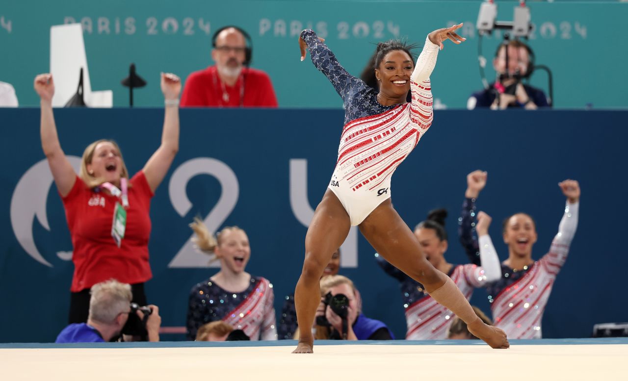 Simone Biles reacts after finishing her floor exercise performance on Tuesday.