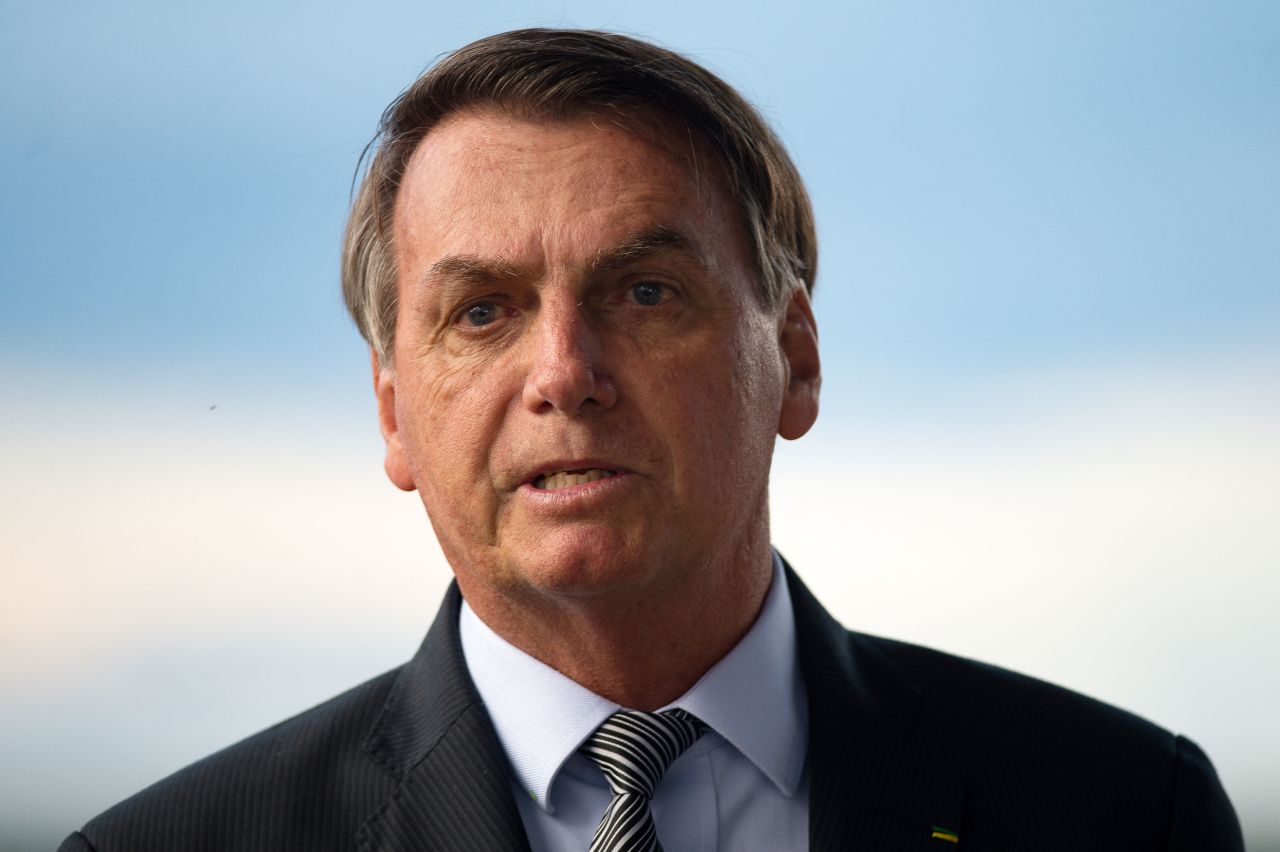 Brazilian President Jair Bolsonaro speaks with press at the Palacio do Alvorada on March 17 in Brasilia, Brazil.