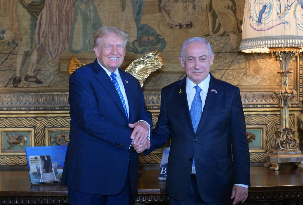 Benjamin Netanyahu meets with former US President Donald Trump at his Mar-a-Lago resort on Friday.