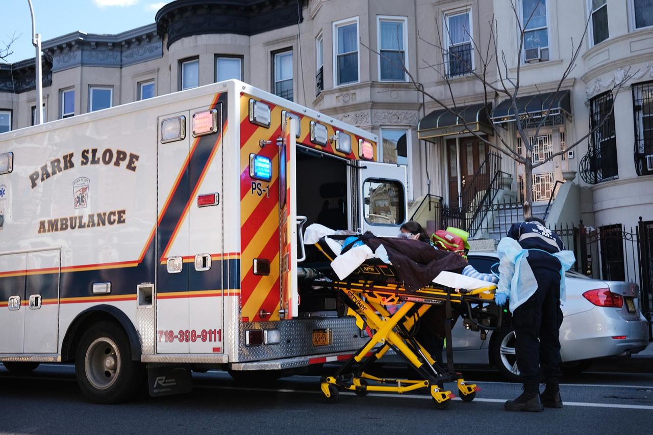 Health workers carry a patient to an ambulance on April 11, 2020 in the Brooklyn borough of New York City.