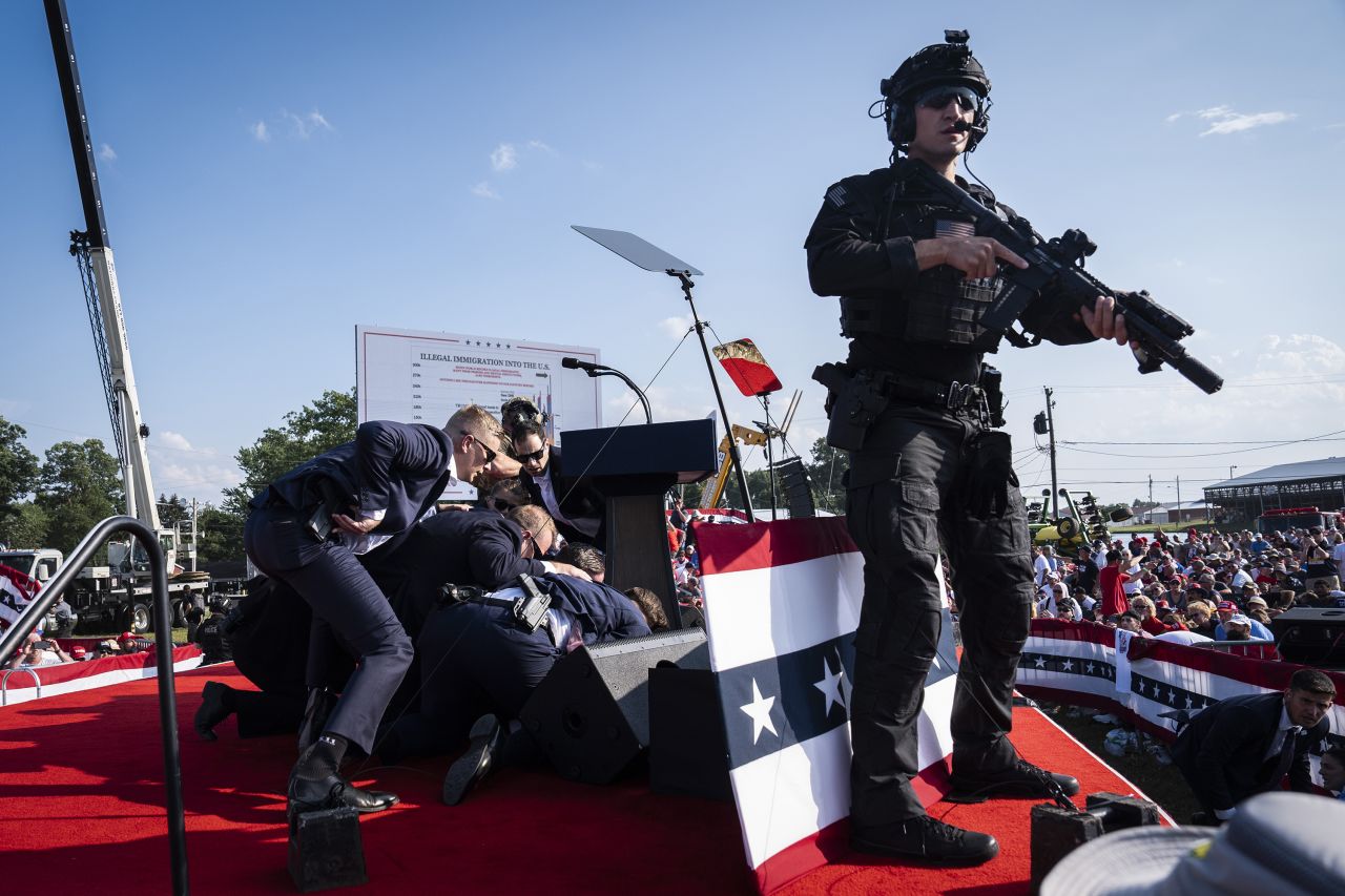 Secret Service agents and counter assault team react after shots were fired toward former president Donald Trump during a campaign rally in Butler, Pennsylvania, on July 13.