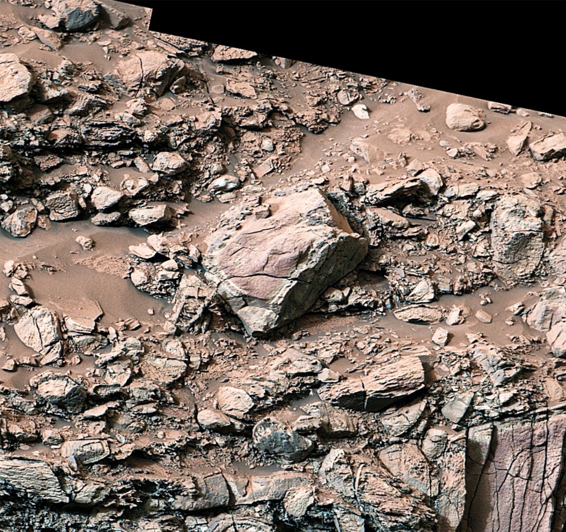 While exploring Gediz Vallis channel in May, Curiosity spied rocks with a pale color near their edges. These rings, called halos, resemble markings seen on Earth when groundwater leaks into rocks along fractures.