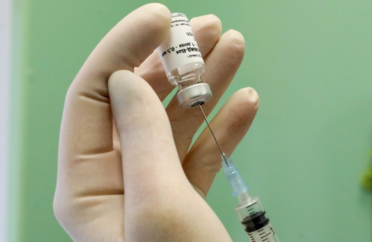 A medical worker prepares the Gam-COVID-Vak vaccine, also known as Sputnik V, for vaccination of medical staff at a hospital in St. Petersburg, Russia, on October 7.