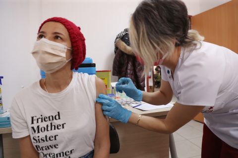 A medical worker receives a dose of the Covid-19 vaccine Sinovac at the Sabiha Uzun Maternal Child Health Center in Ankara, Turkey on January 15, 2021. 