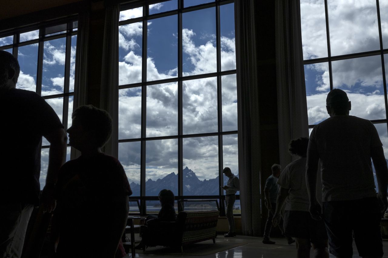 Visitors are seen in the lobby of the Jackson Lake Lodge at Grand Teton National Park near Jackson Hole, Wyoming, on Thursday.