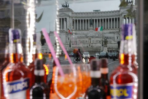 Piazza Venezia Square is reflected in the window of a closed coffee bar following Covid-19 restriction measures in Rome, Italy on January 22.