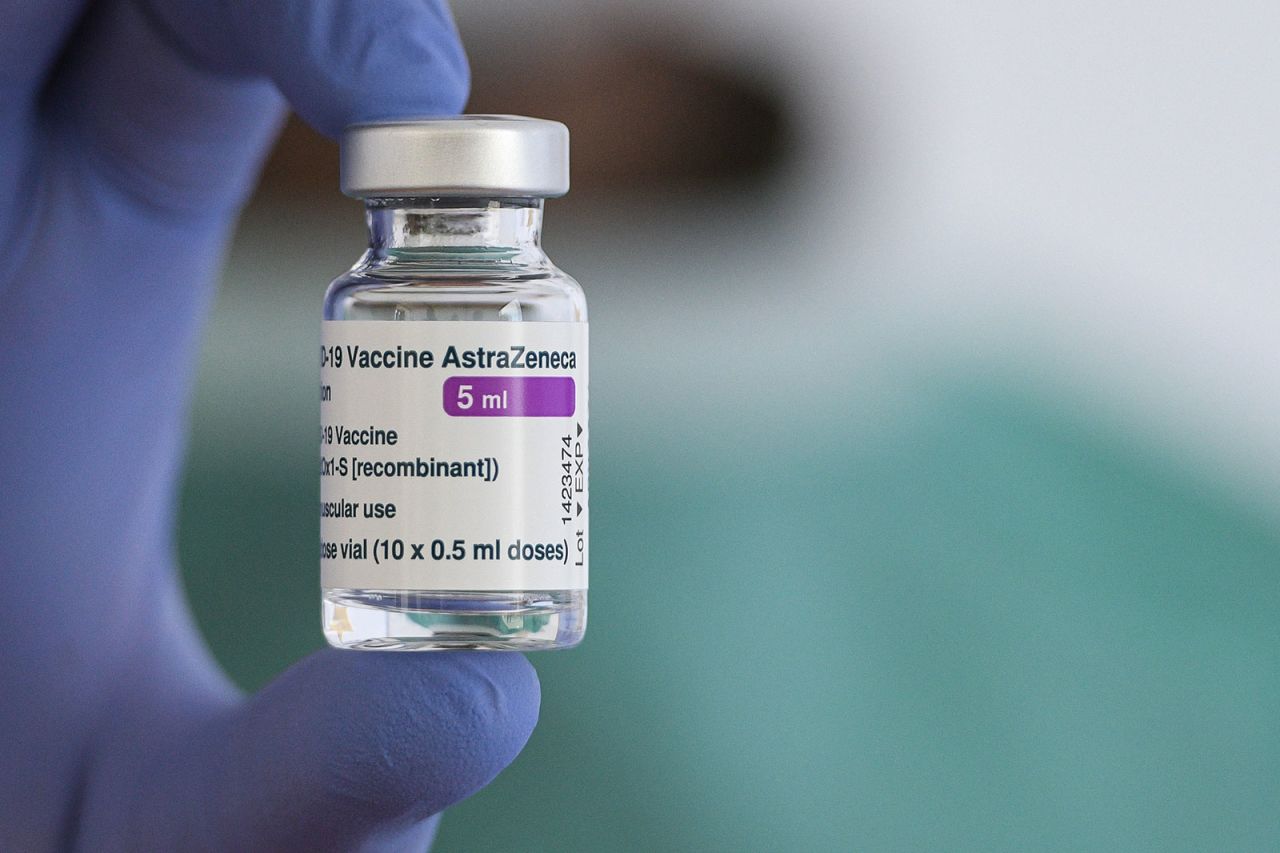 A doctor holds a vial of the AstraZeneca vaccine at a drive-thru clinic in Milan, Italy, on March 15.