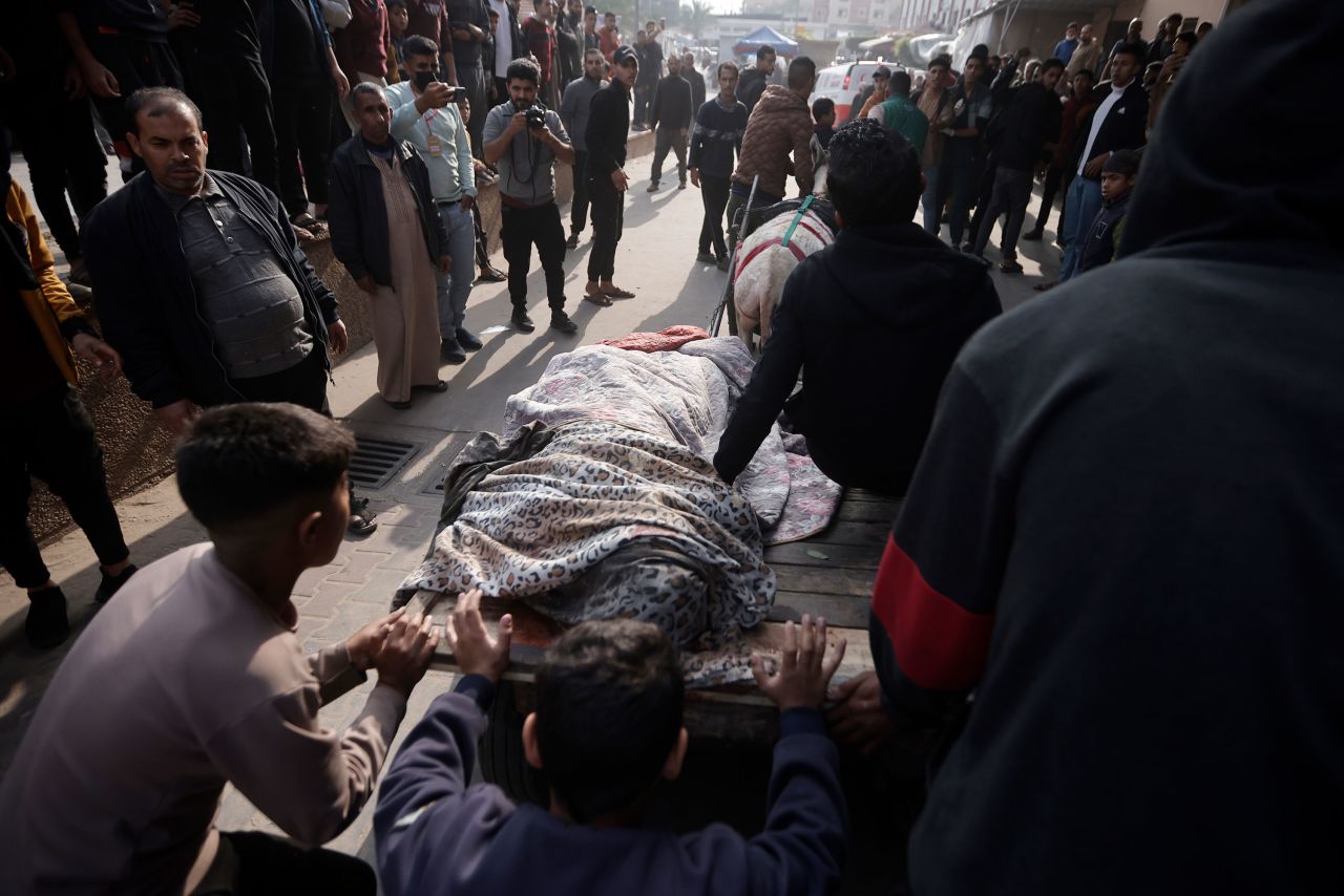 Palestinians killed in the Israeli bombardment of Gaza are brought on a donkey cart to the hospital in Khan Younis, Gaza, on Wednesday. 