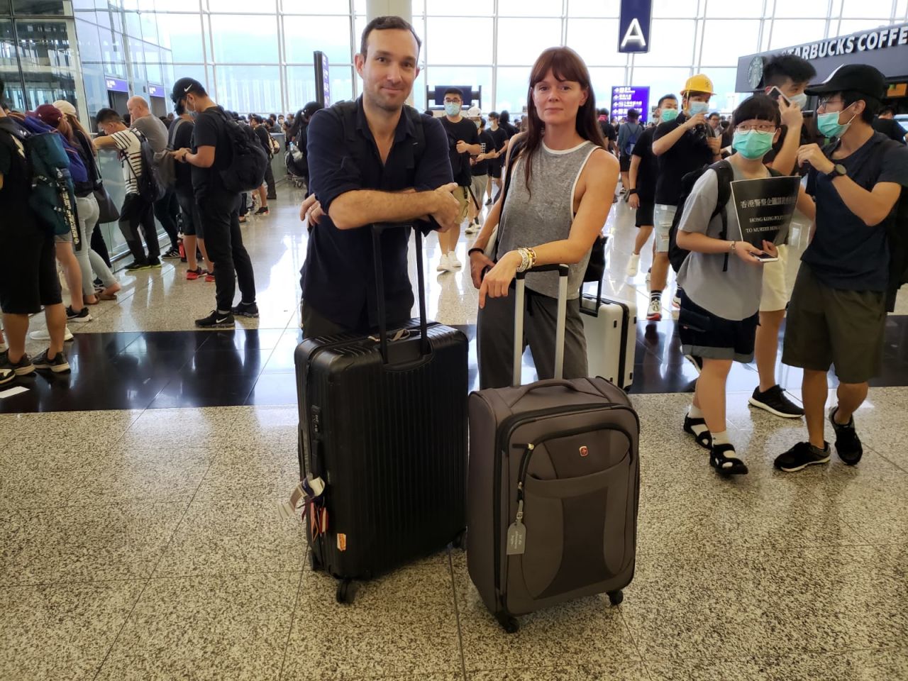 Hong Kong permanent resident Lawrence Hahn (left) said he was supposed to be flying to New York today.